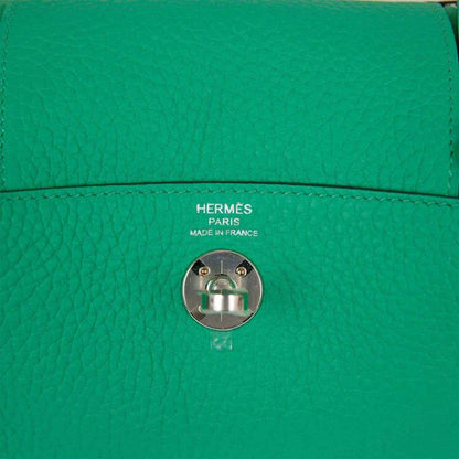 Hermes mini green leather handbag with snap hardware and logo stamp