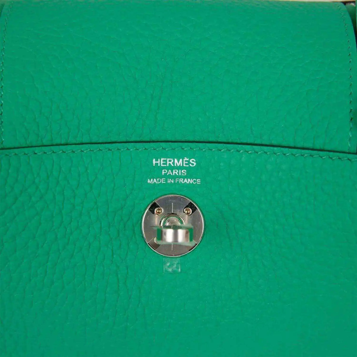 Hermes mini green leather handbag with snap hardware and logo stamp