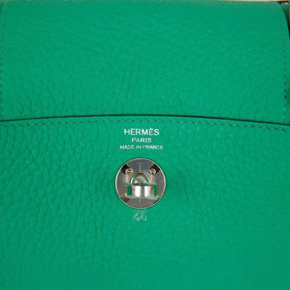 Hermes mini green leather handbag with snap hardware and logo stamp