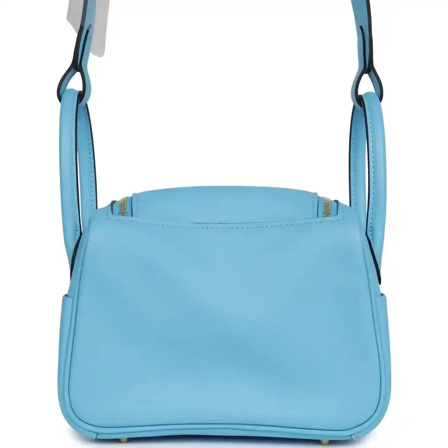 Light blue leather mini handbag with top opening edge and two carry handles