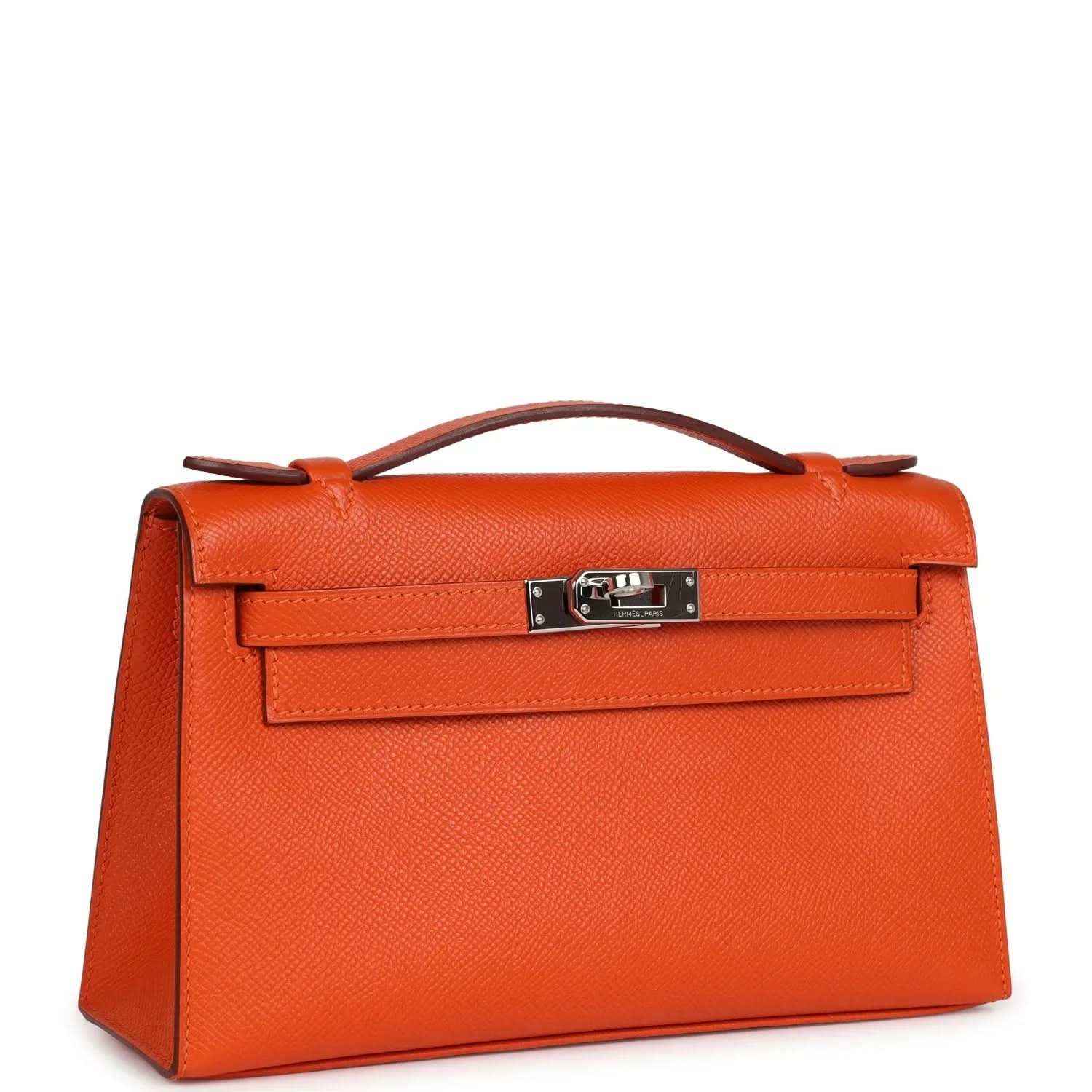 Orange Epsom leather Kelly clutch with top handle and front flap, silver-tone clasp