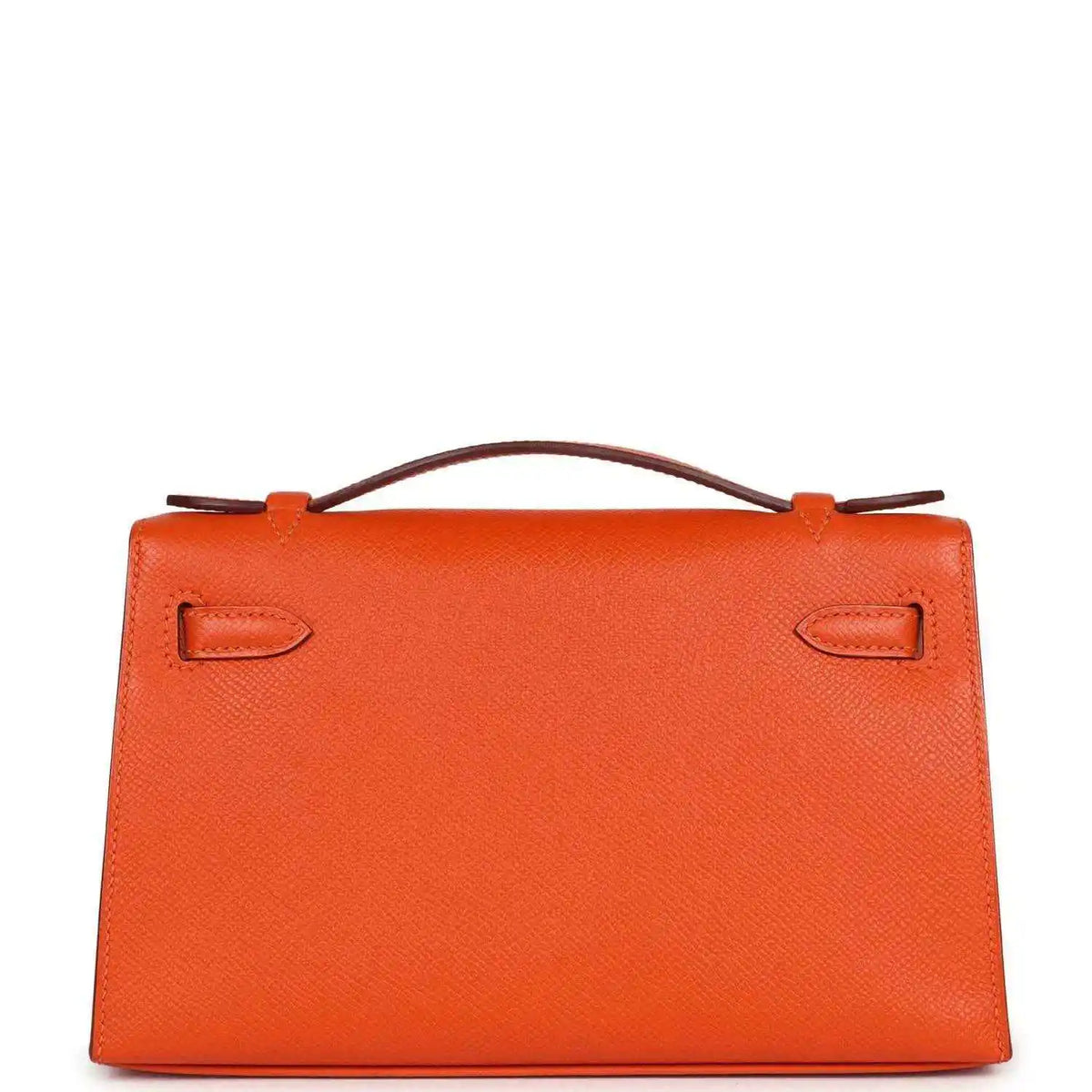 Orange Epsom leather clutch front with top handle and two flap corner straps