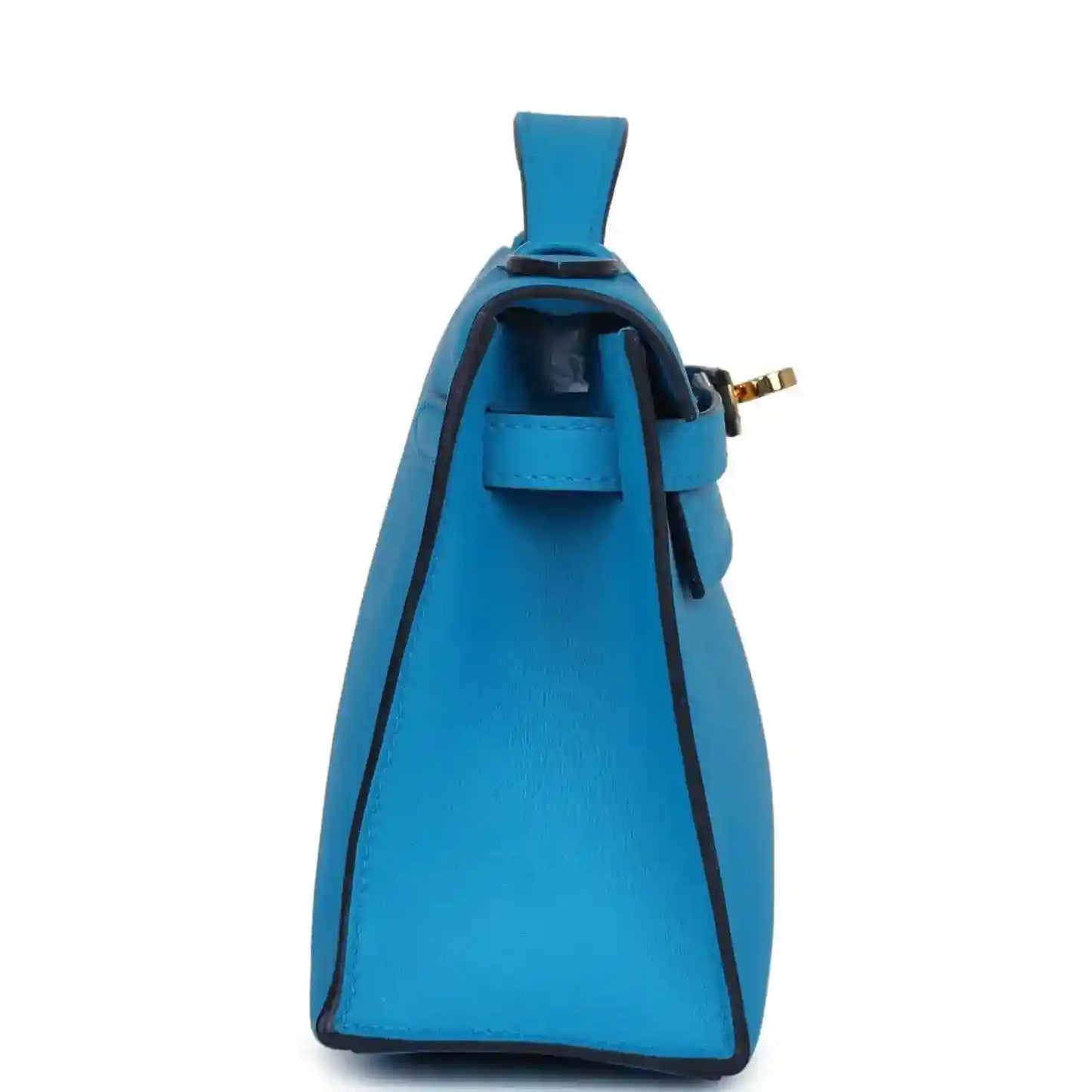 Hermes Kelly pochette handbag in blue, back view with opening and strap
