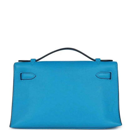 Hermes Kelly pochette handbag in blue with two top handle loops