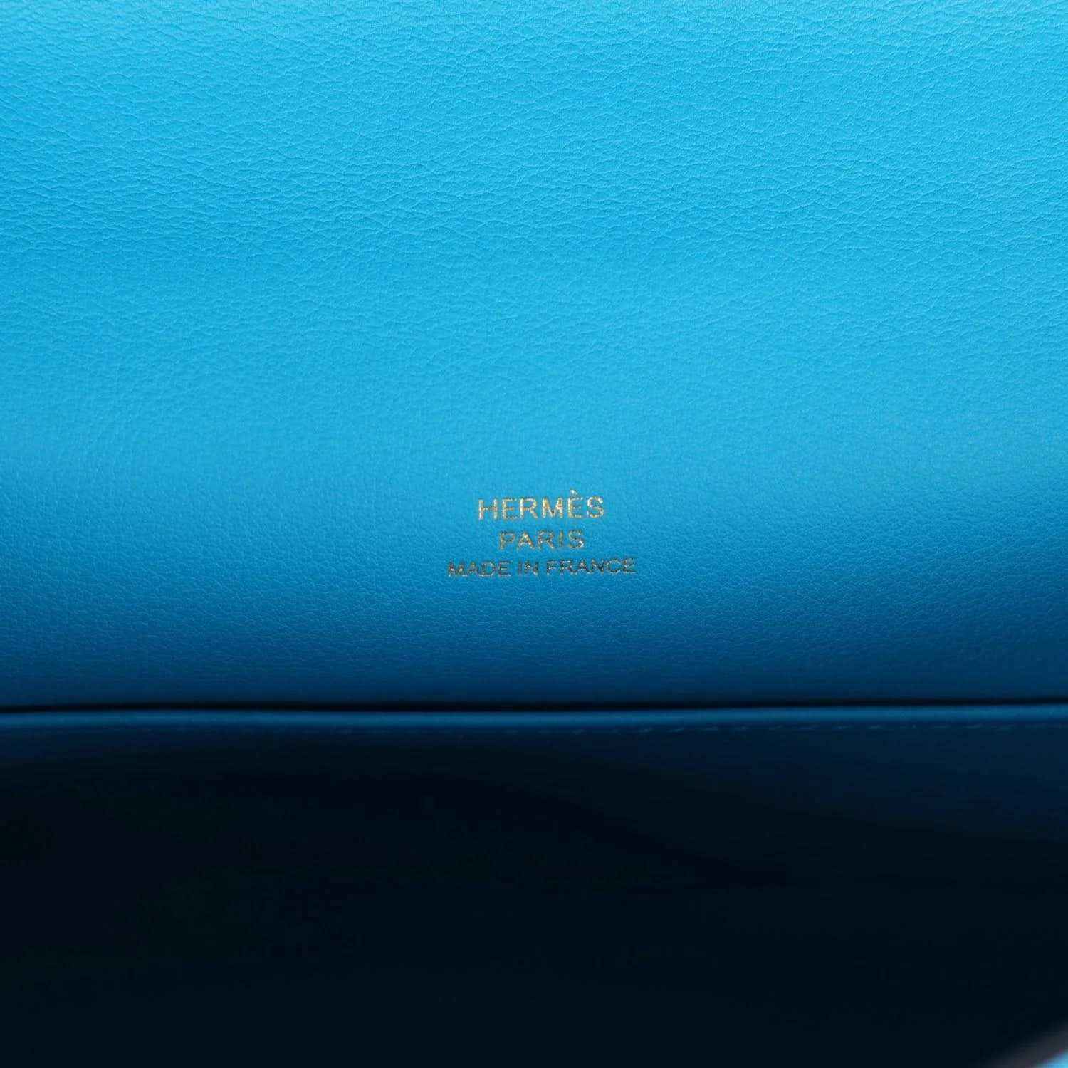 Hermes leather pochette handbag interior with stamped Hermes Paris branding