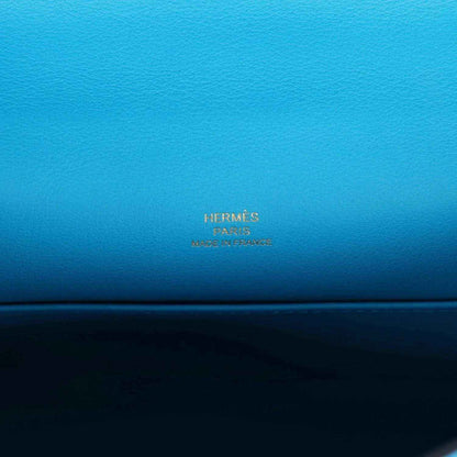 Hermes leather pochette handbag interior with stamped Hermes Paris branding