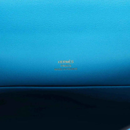 Hermes leather pochette handbag interior with stamped Hermes Paris branding