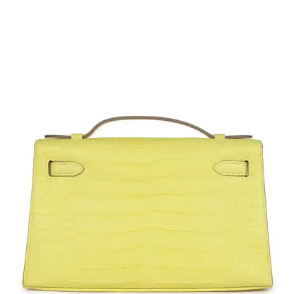Lime alligator clutch back panel with top handle and corner strap tabs