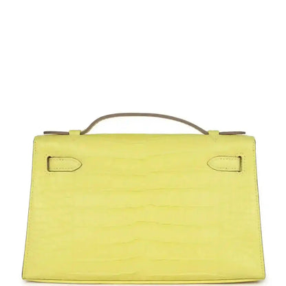 Lime alligator clutch back panel with top handle and corner strap tabs