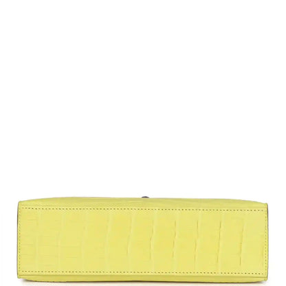 Lime alligator clutch base panel with perimeter stitching