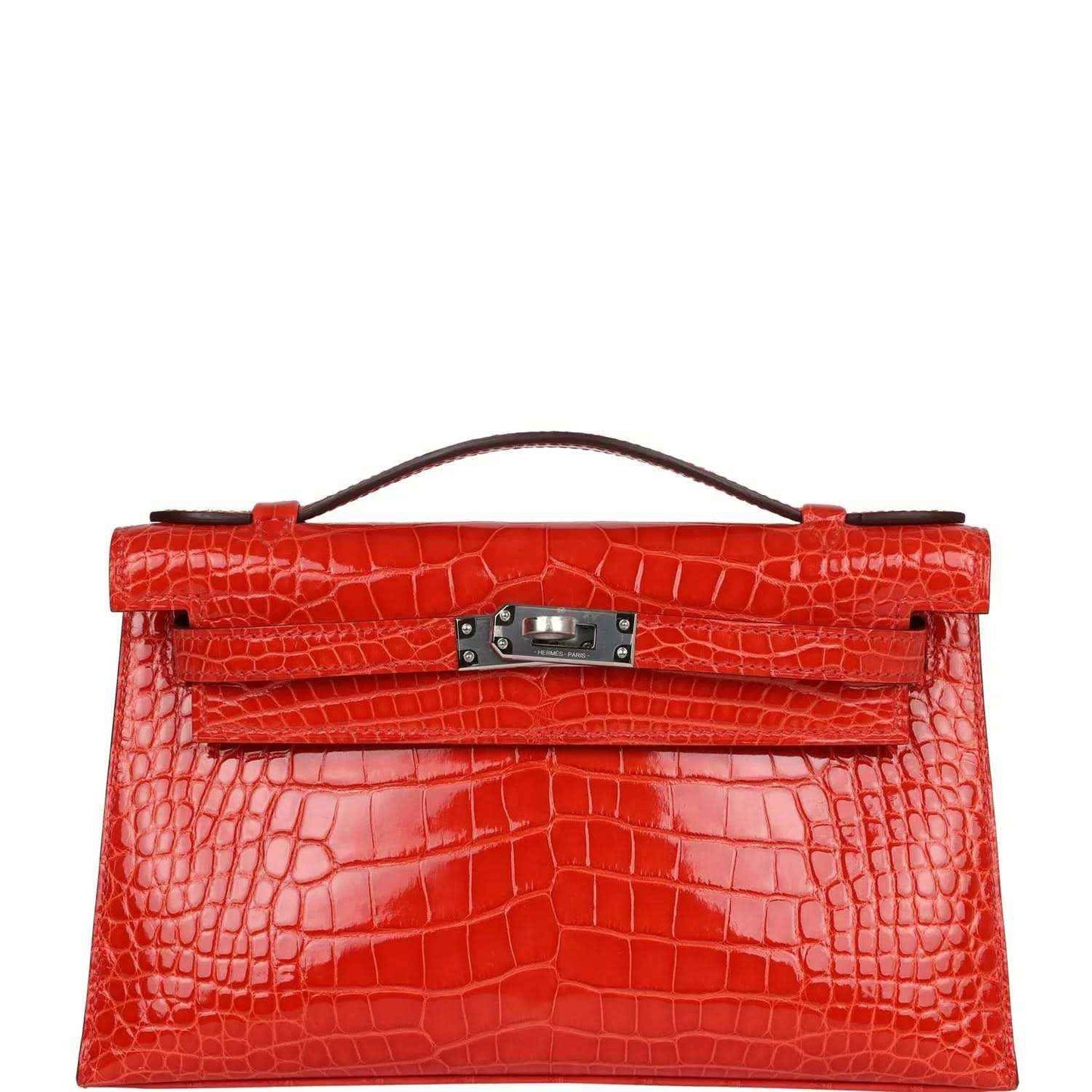 Orange crocodile-texture Kelly pochette with top handle and front clasp hardware