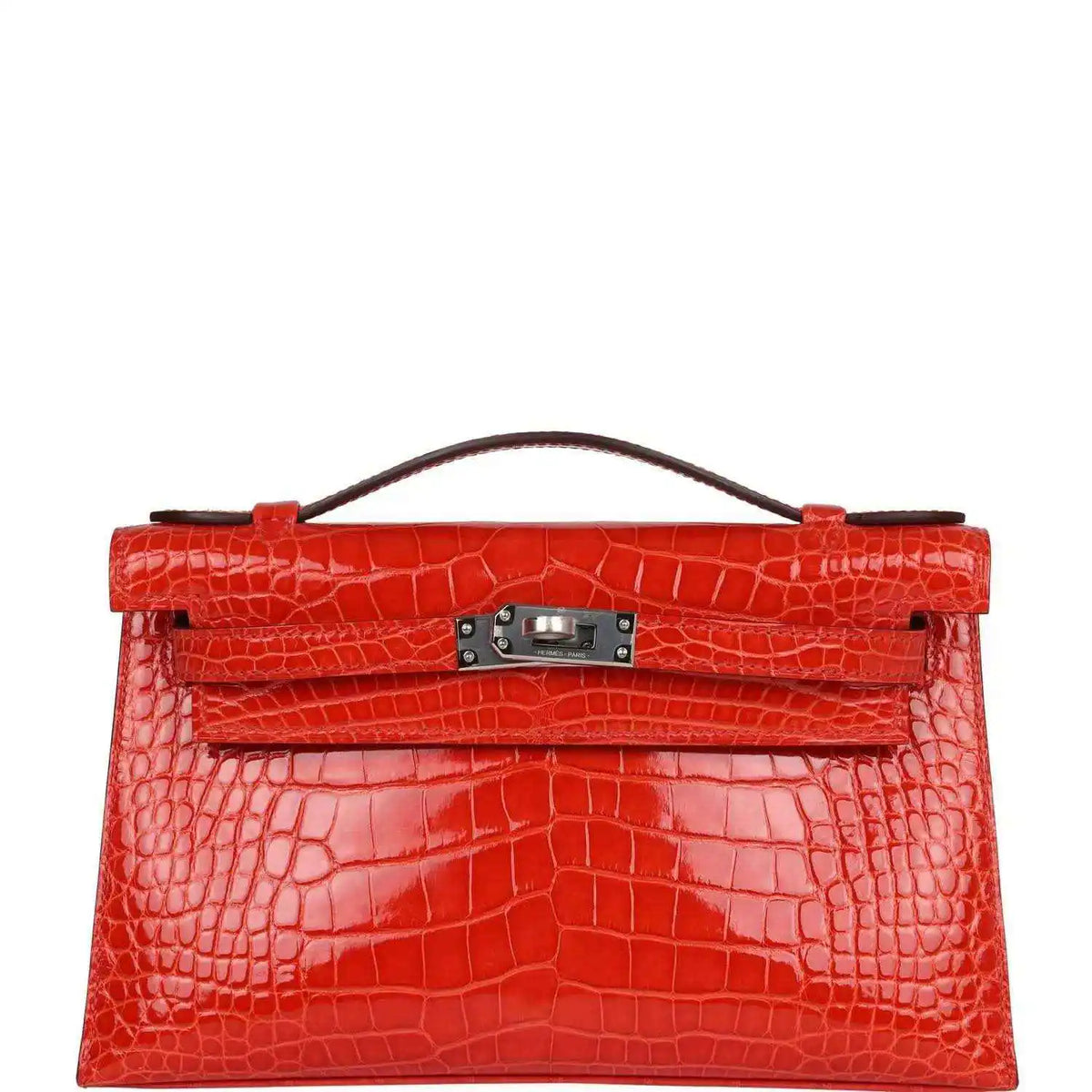Orange crocodile-texture Kelly pochette with top handle and front clasp hardware