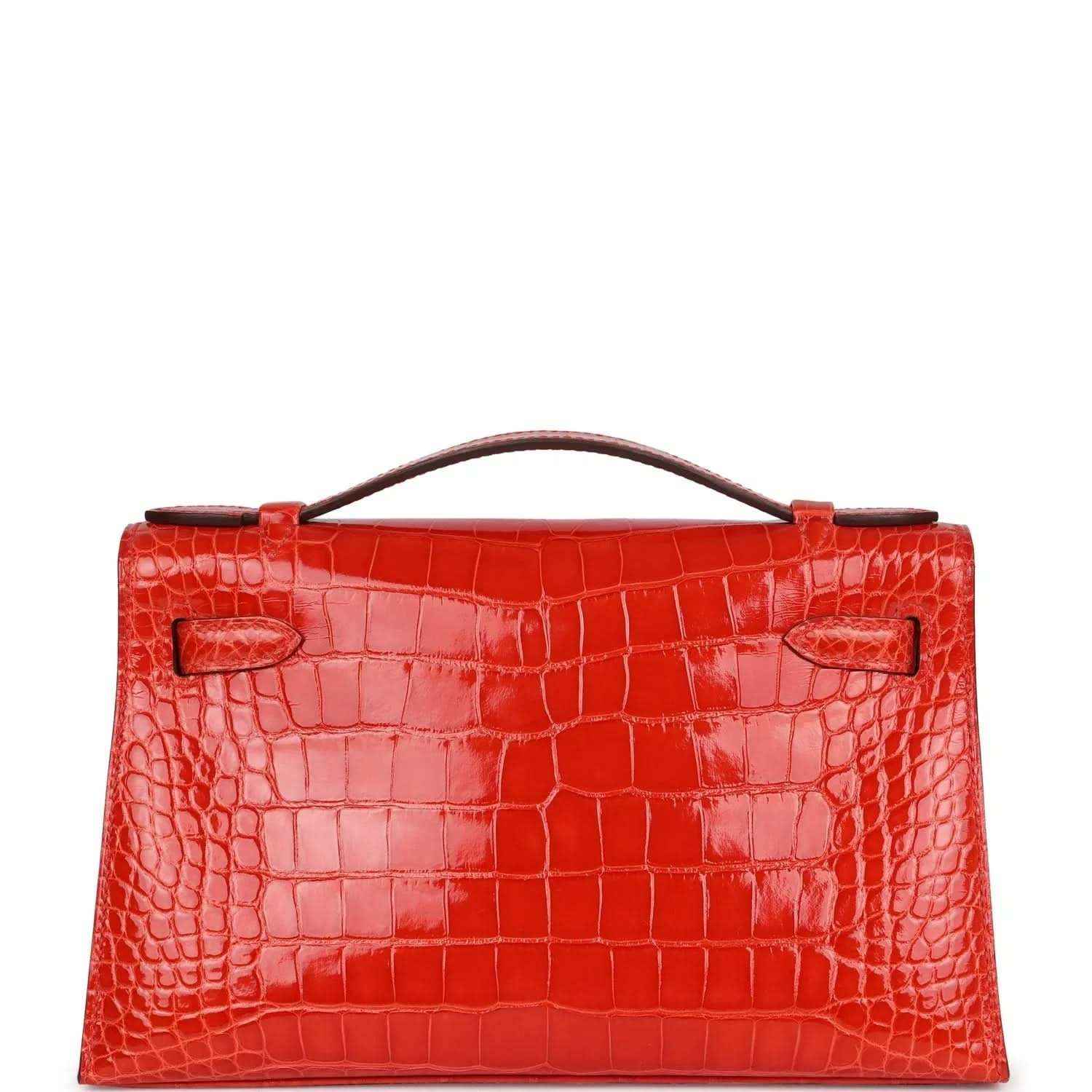 Orange crocodile-texture Kelly pochette with rear flap and top handle, clasp details