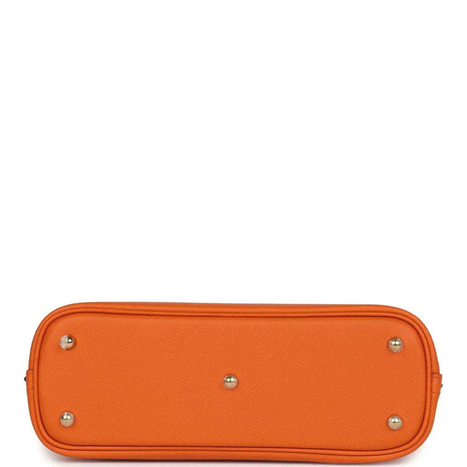 Orange leather handbag base with four silver-toned feet and smooth top edge.
