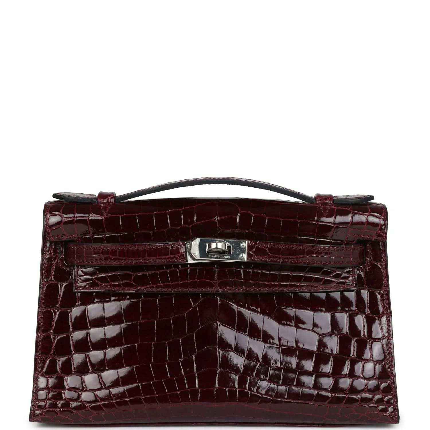 Burgundy crocodile-pattern handbag with top handle and front clasp hardware
