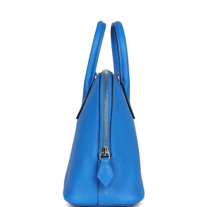 Mini Bolide bag in bright blue textured leather, back view with zipper detail