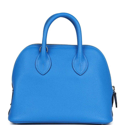 Mini Bolide bag in bright blue textured leather with two top handles and side tassel