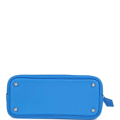 Mini Bolide bag in bright blue textured leather with top zipper and metal corner studs