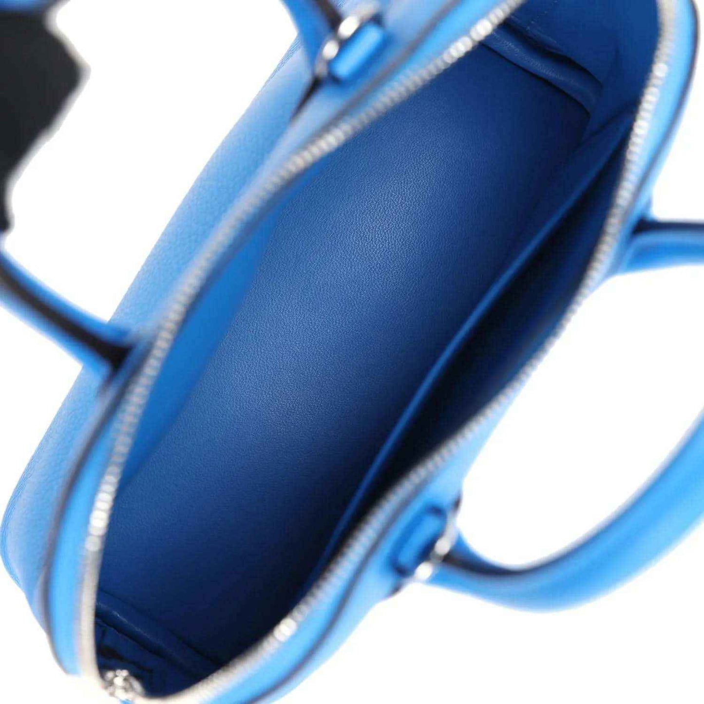 Mini Bolide bag interior in bright blue leather with zipper closure and edge stitching