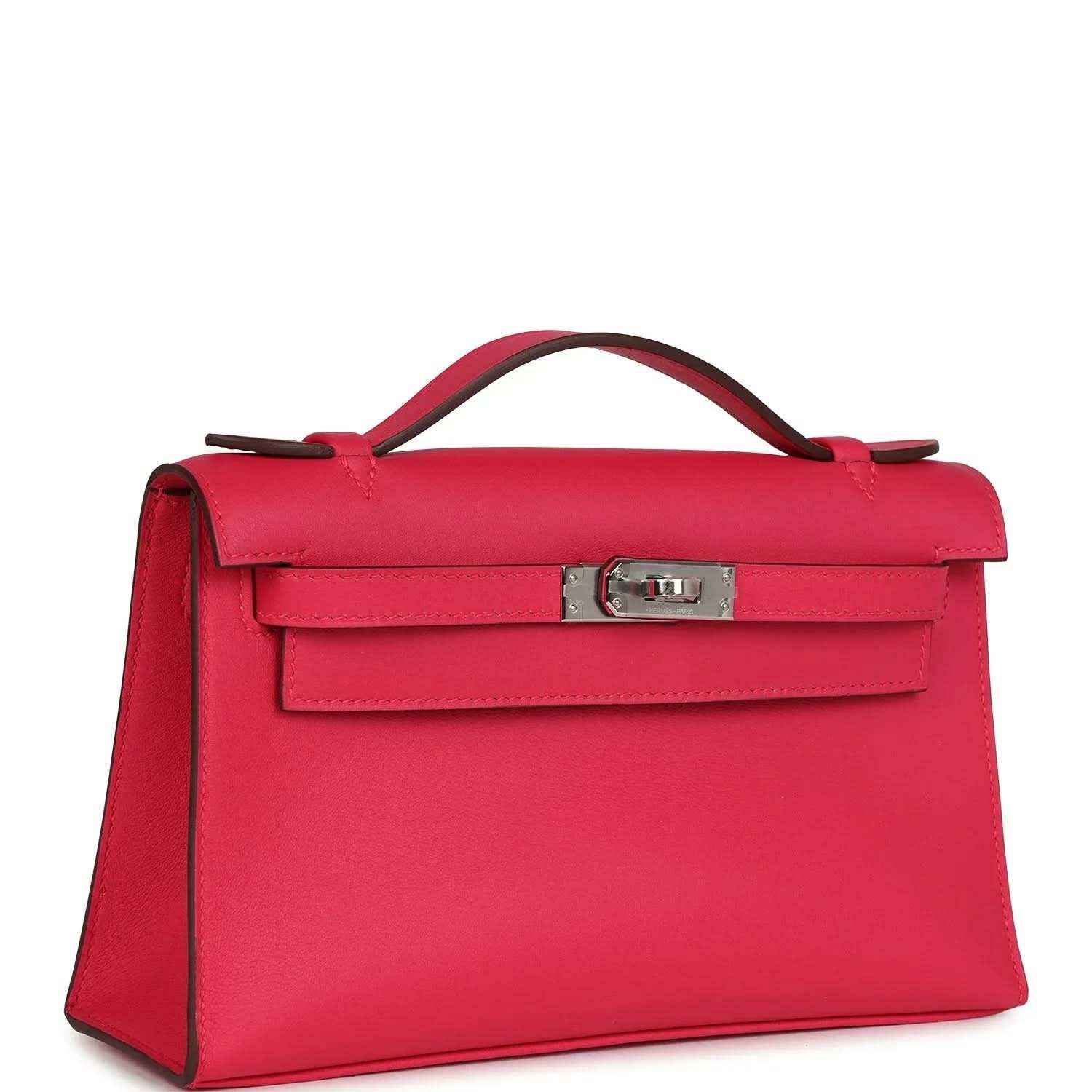 Pink leather handbag with top handle, front flap, and side view