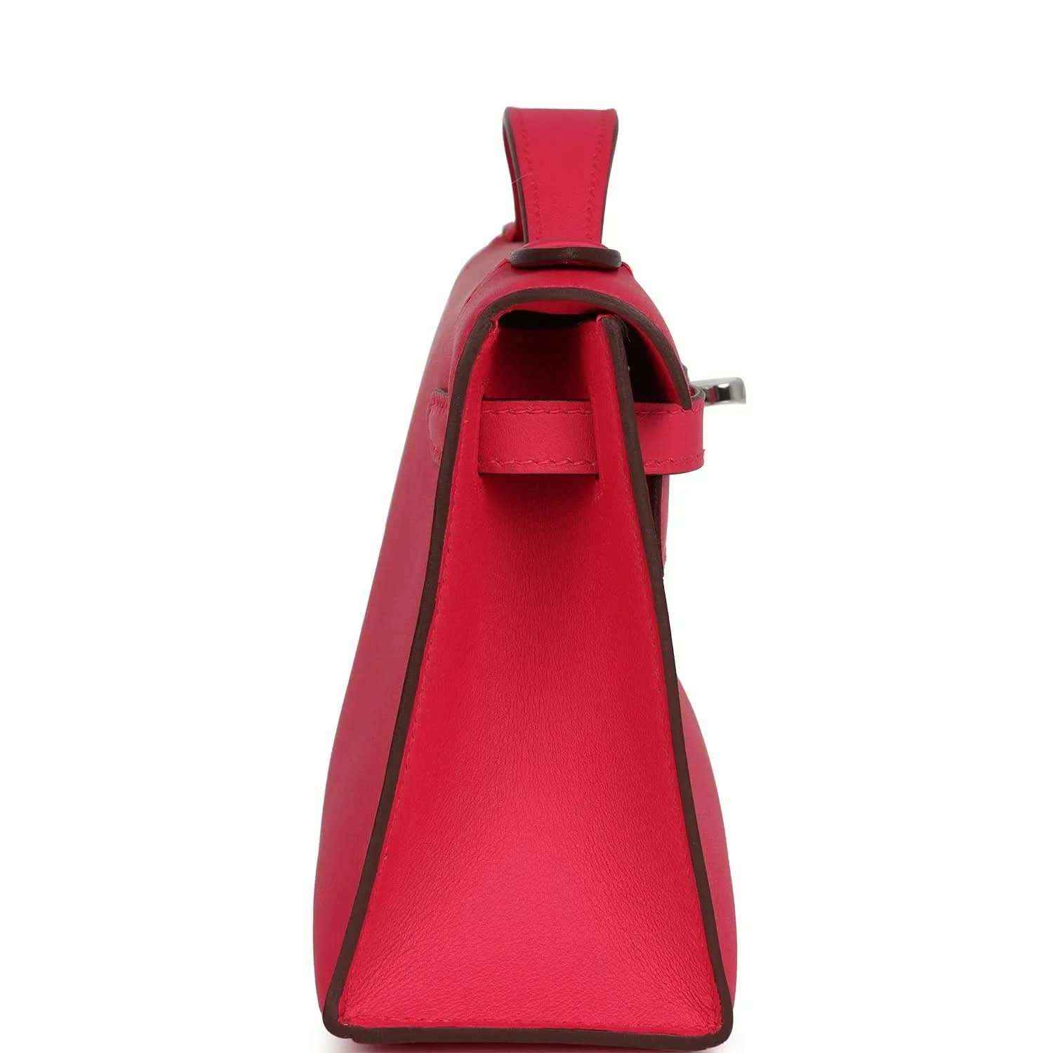 Pink leather handbag with open front flap and interior pocket