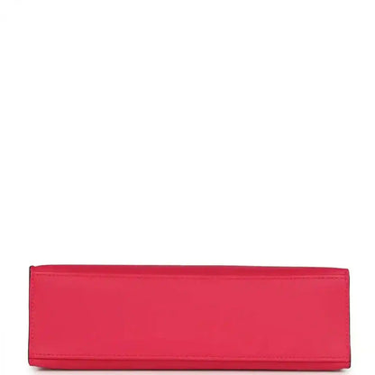 Pink leather pochette-style clutch with stitched edges and flat panel