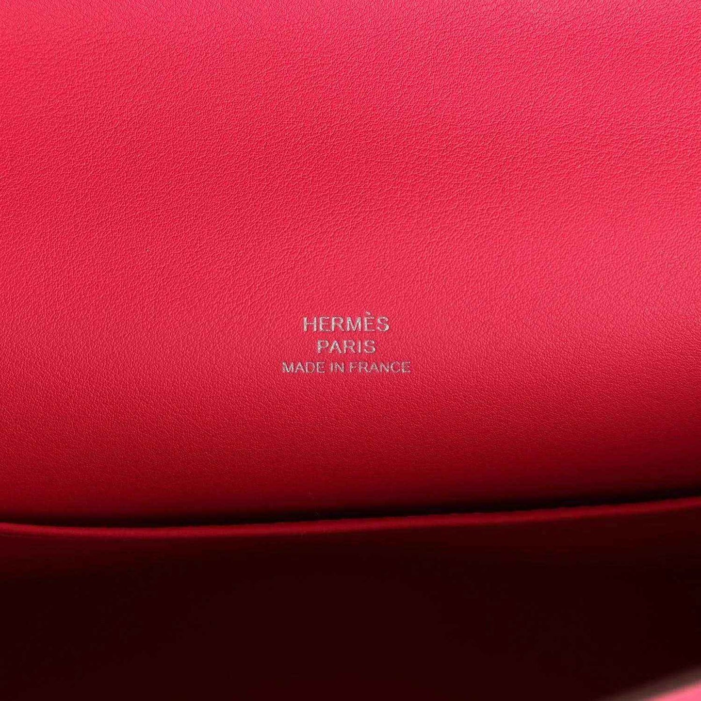 Hermès logo embossing on pink leather