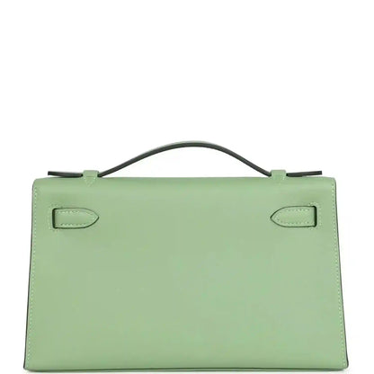 Hermes Kelly pochette back panel in light green leather with two stitched tabs