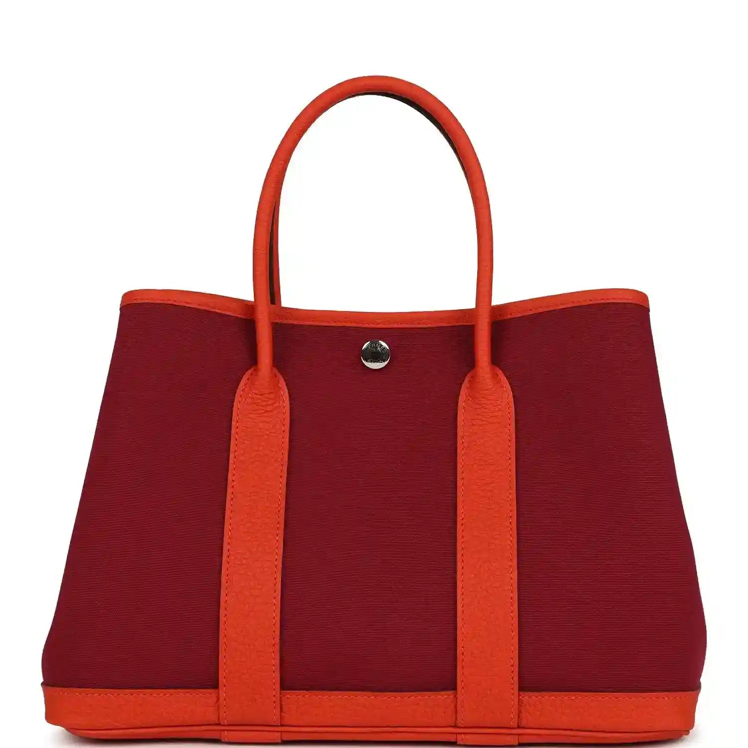 Rubis canvas and leather tote bag with two top handles and front metal snap