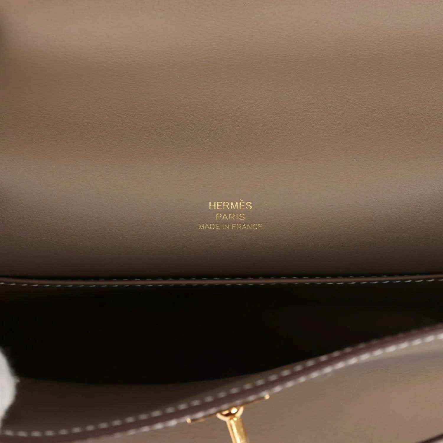 Hermes clutch leather with Hermès Paris stamp and contrast edge stitching