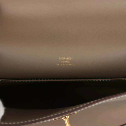 Hermes clutch leather with Hermès Paris stamp and contrast edge stitching