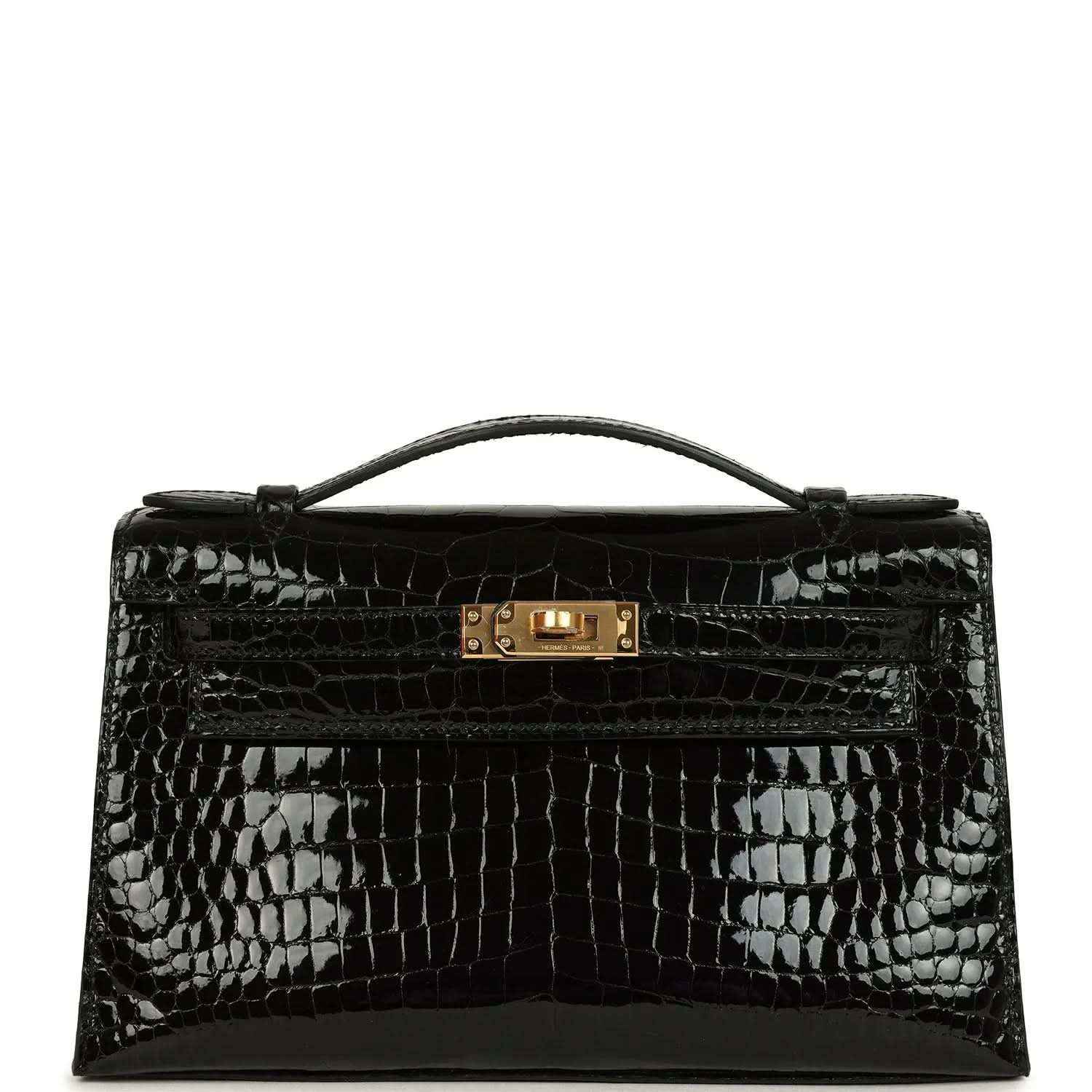 Black shiny crocodile skin handbag with top handle and gold front clasp