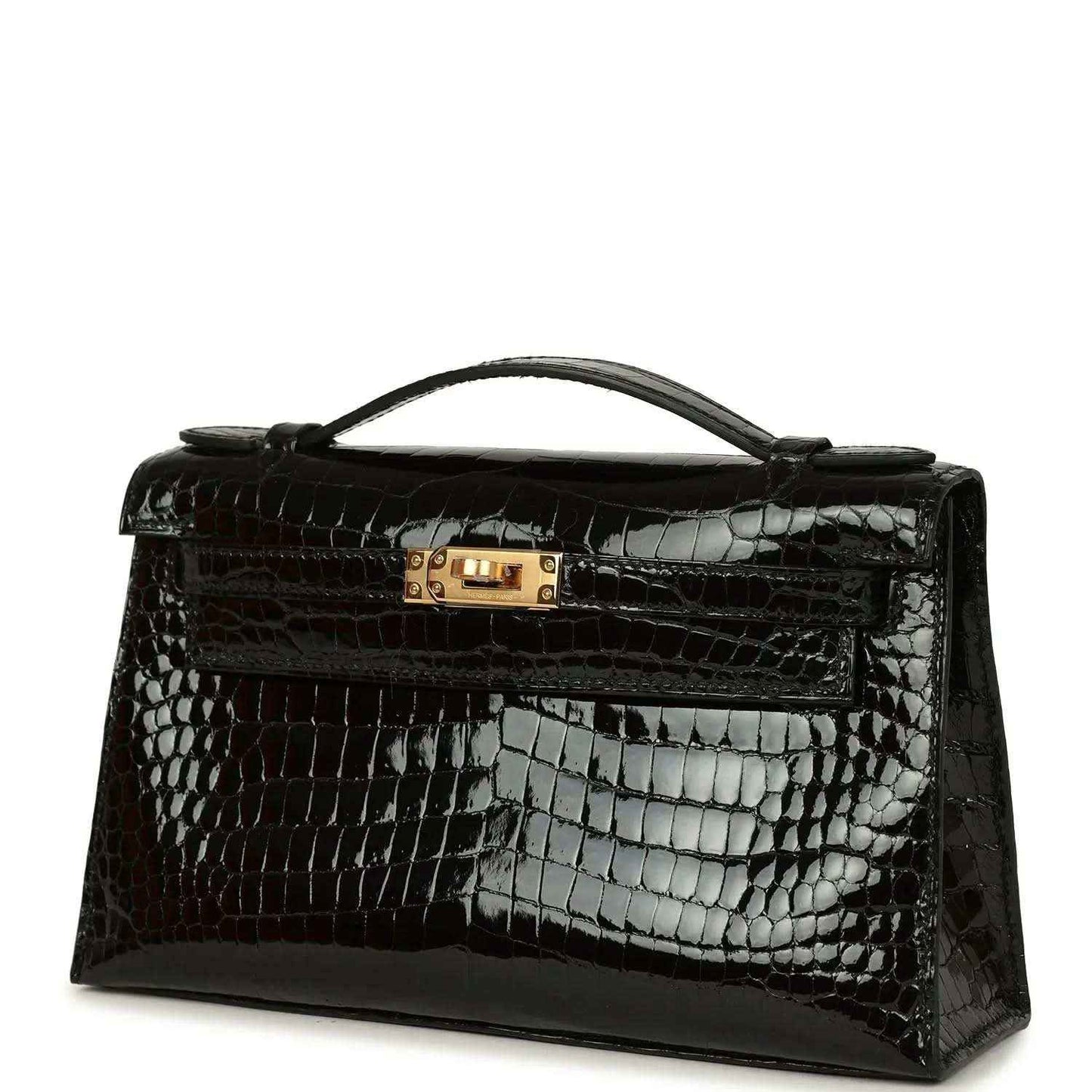 Black crocodile skin handbag with gold clasp, top handle, and embossed shine