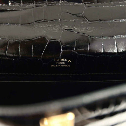 Hermès Paris Made in France stamp on black crocodile leather lining