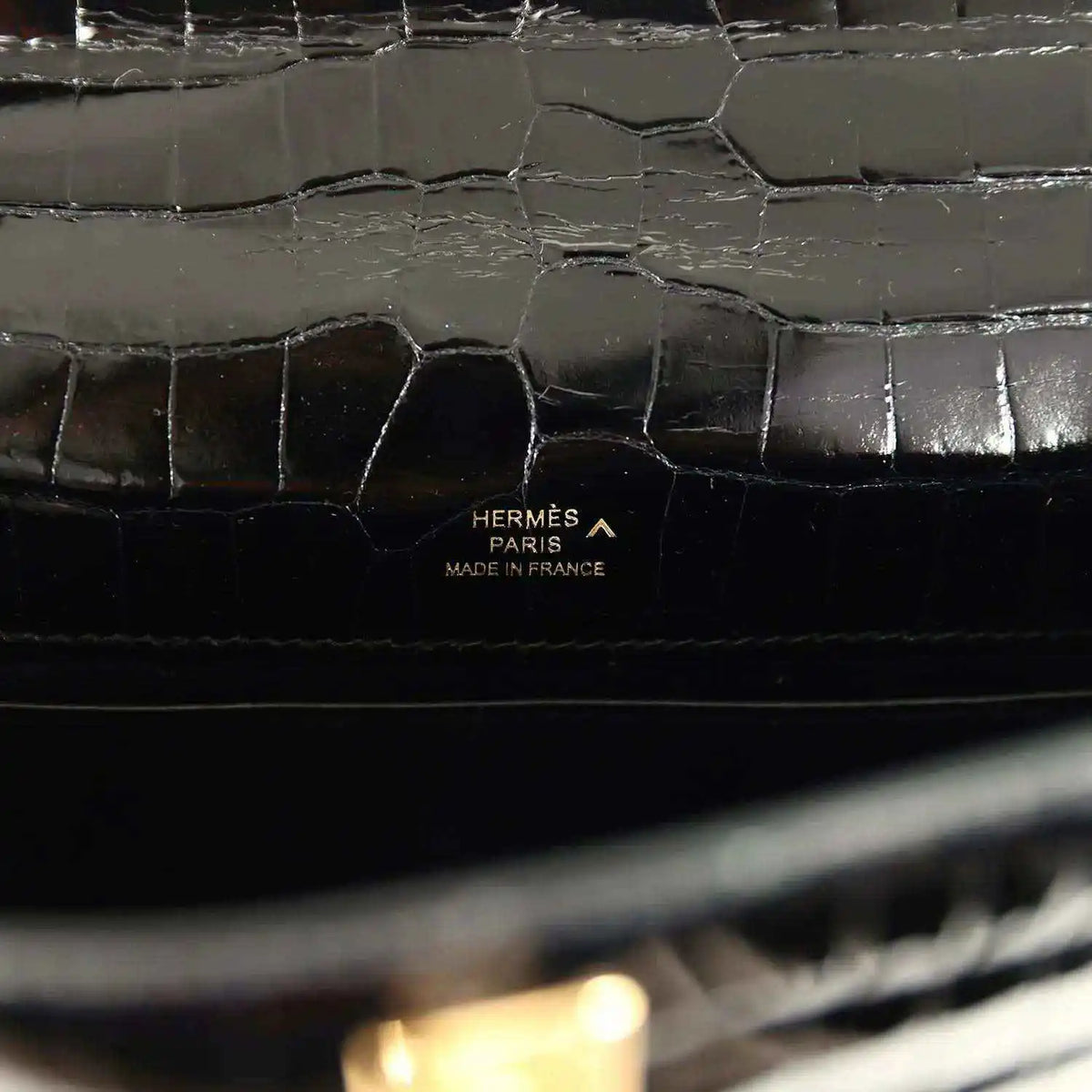 Hermès Paris Made in France stamp on black crocodile leather lining