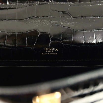 Hermès Paris Made in France stamp on black crocodile leather lining
