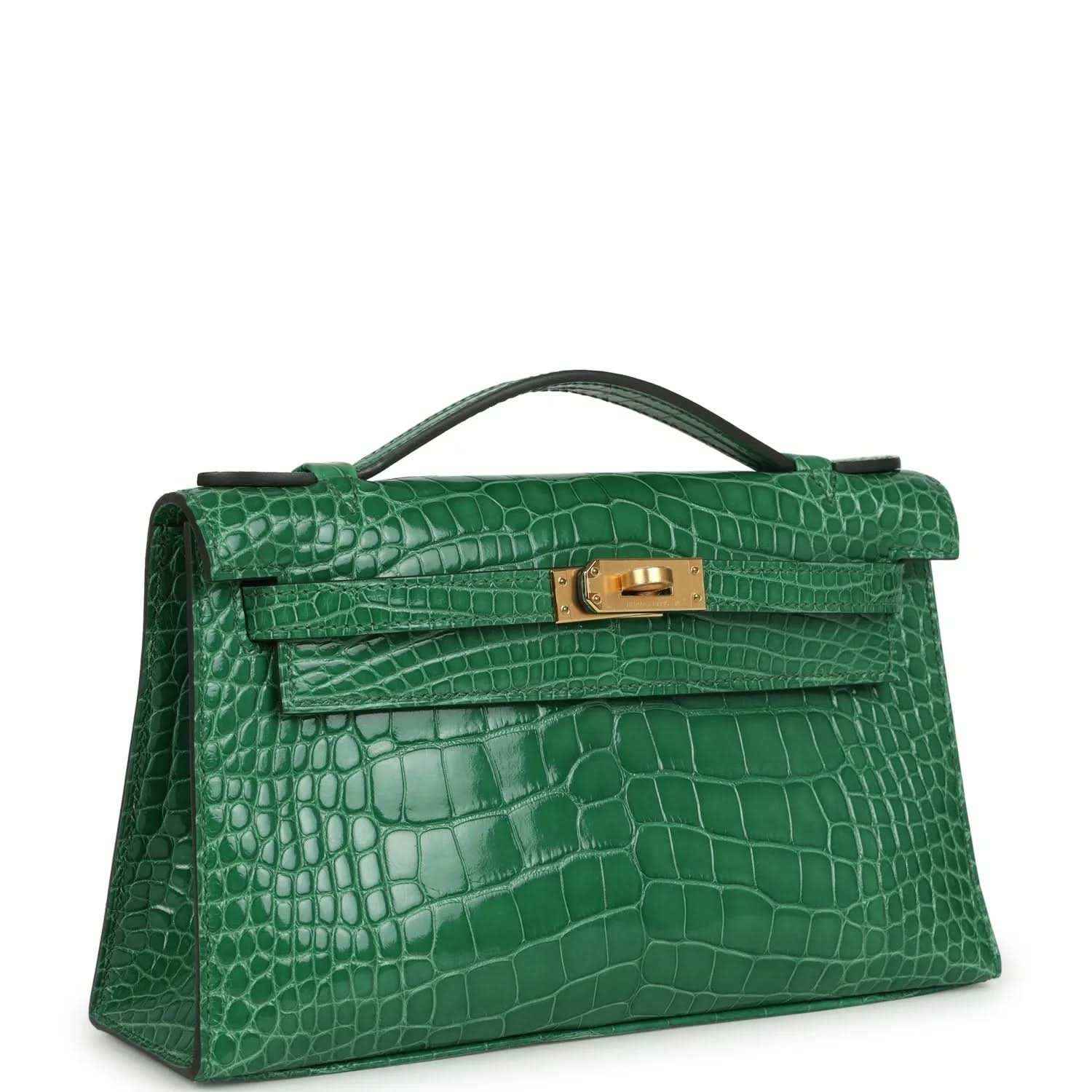 Hermes Kelly clutch with front flap, gold clasp, and green crocodile texture