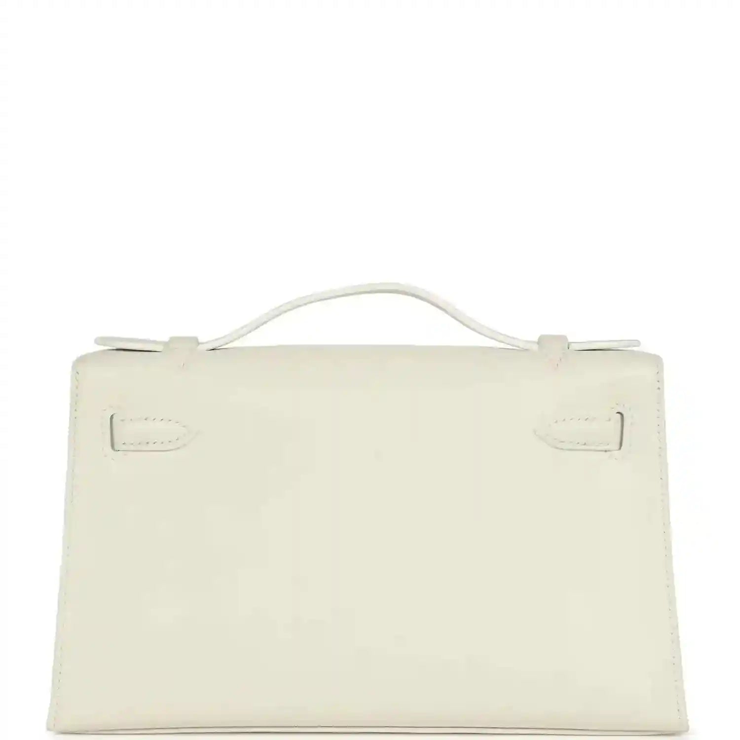 White leather clutch bag with top handle and front flap, viewed from back