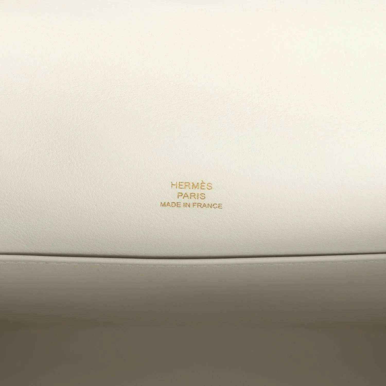 Hermès Paris Made in France leather stamp on light interior panel