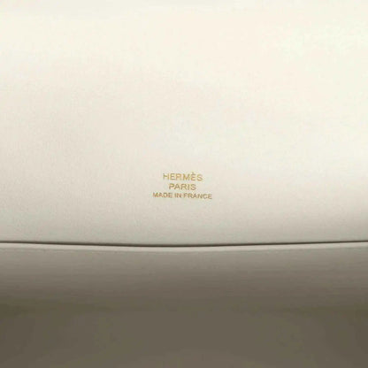 Hermès Paris Made in France leather stamp on light interior panel