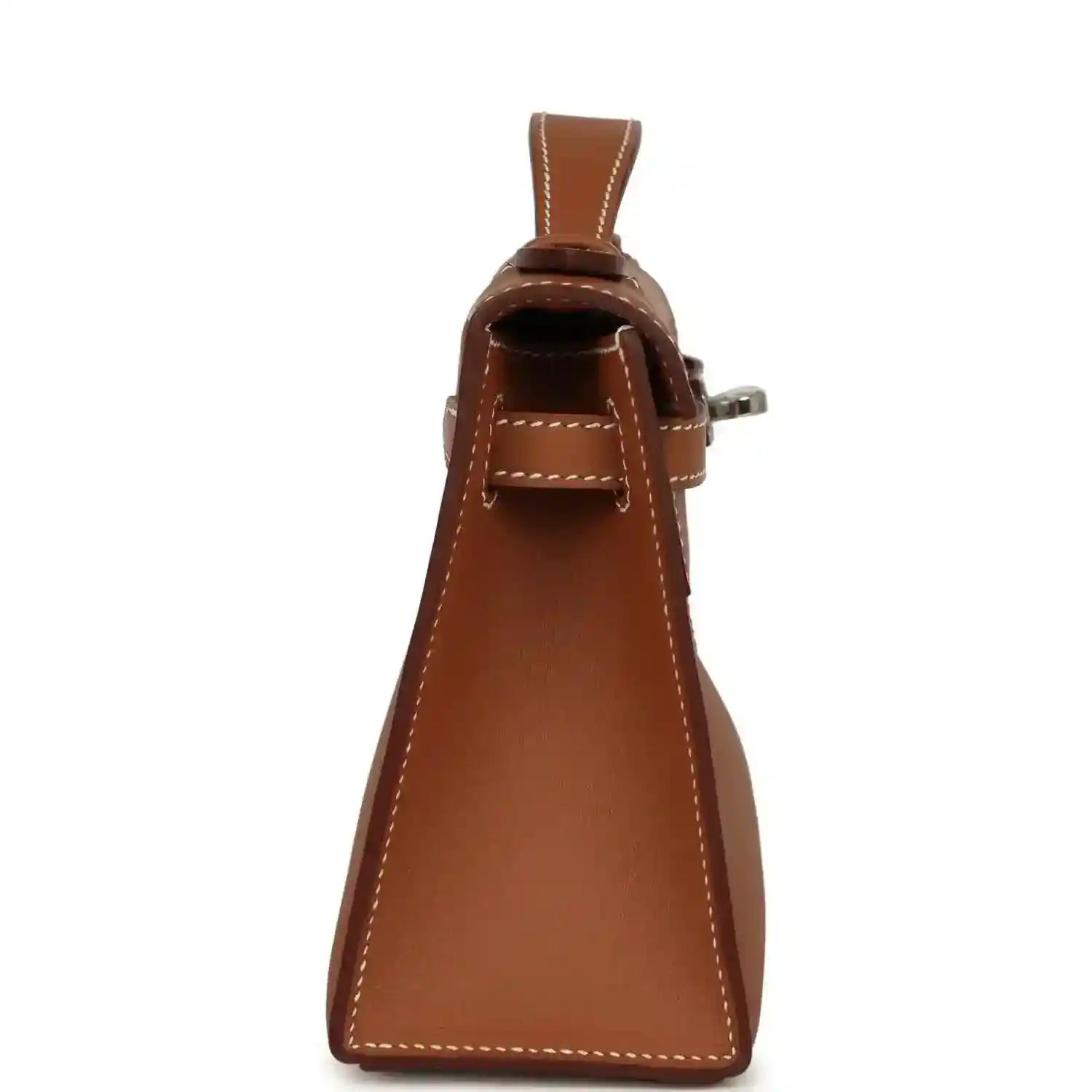 Brown leather clutch with top handle and side button detail