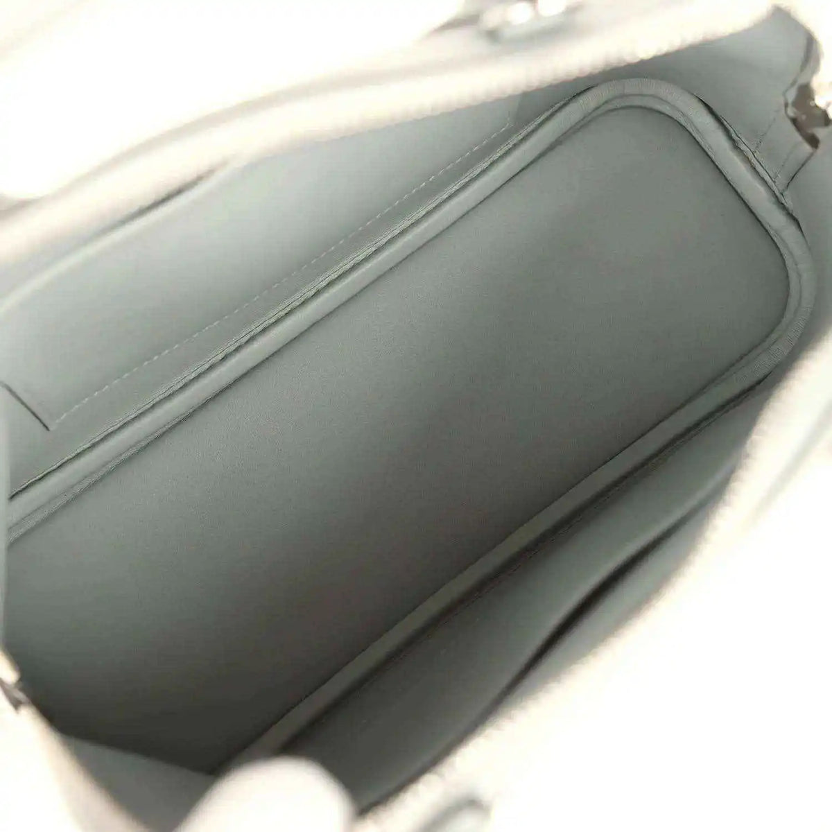 Light gray leather Bolide interior view with smooth lining and stitched seams