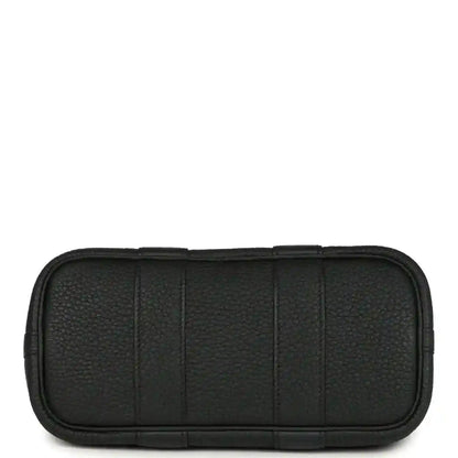 Black leather tote bag back panel with stitched horizontal base seam