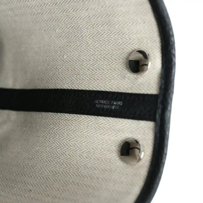Hermes Paris stamp on tote bag interior lining with black trim