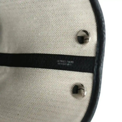 Hermes Paris stamp on tote bag interior lining with black trim
