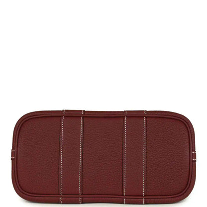 Red leather tote bag base with stitched panel detailing and rounded corners.