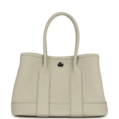 Hermes Garden Party Neo 23 tote bag in light beige textured leather with two top handles
