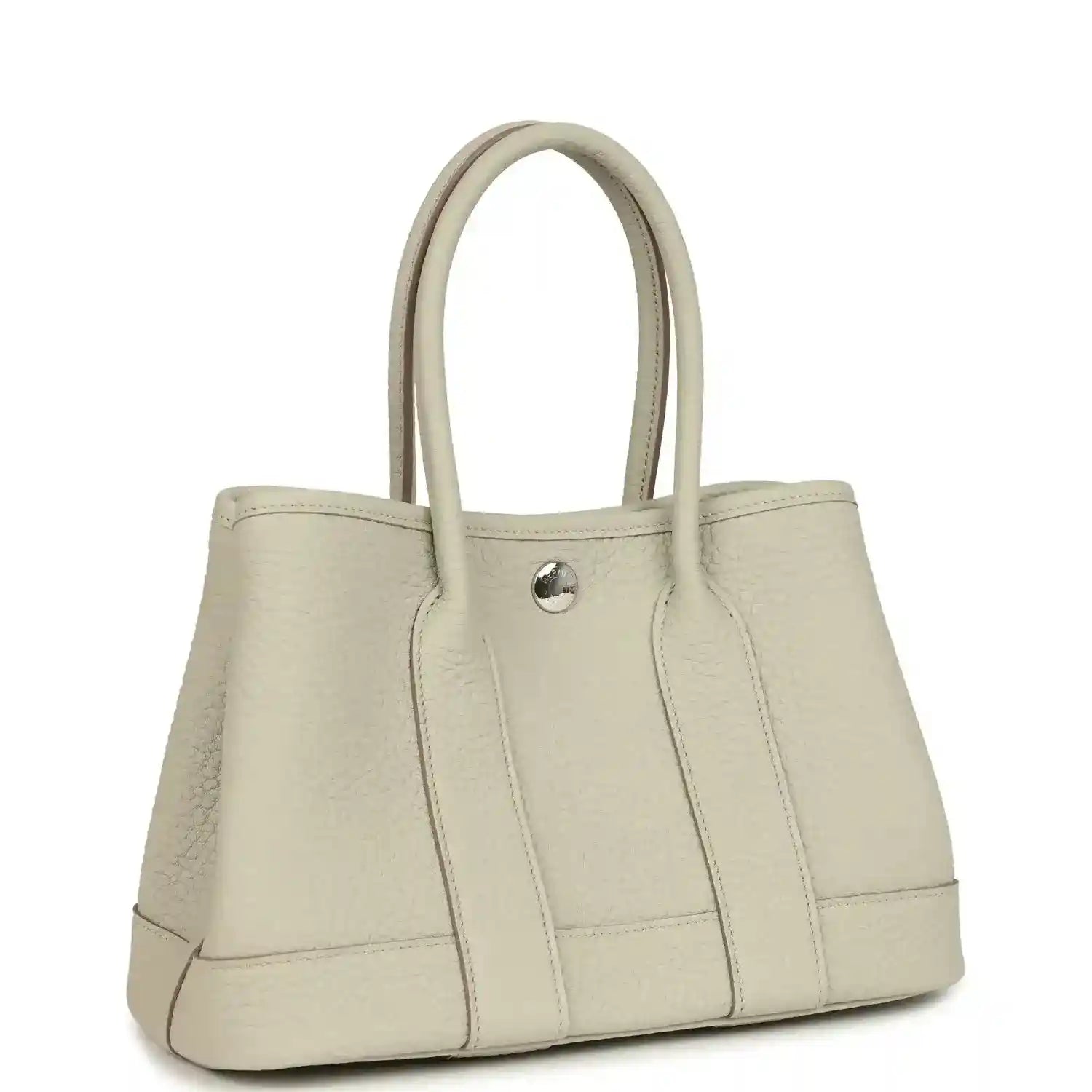Hermes Garden Party Neo 23 tote bag front view in light beige leather with top handles and center snap