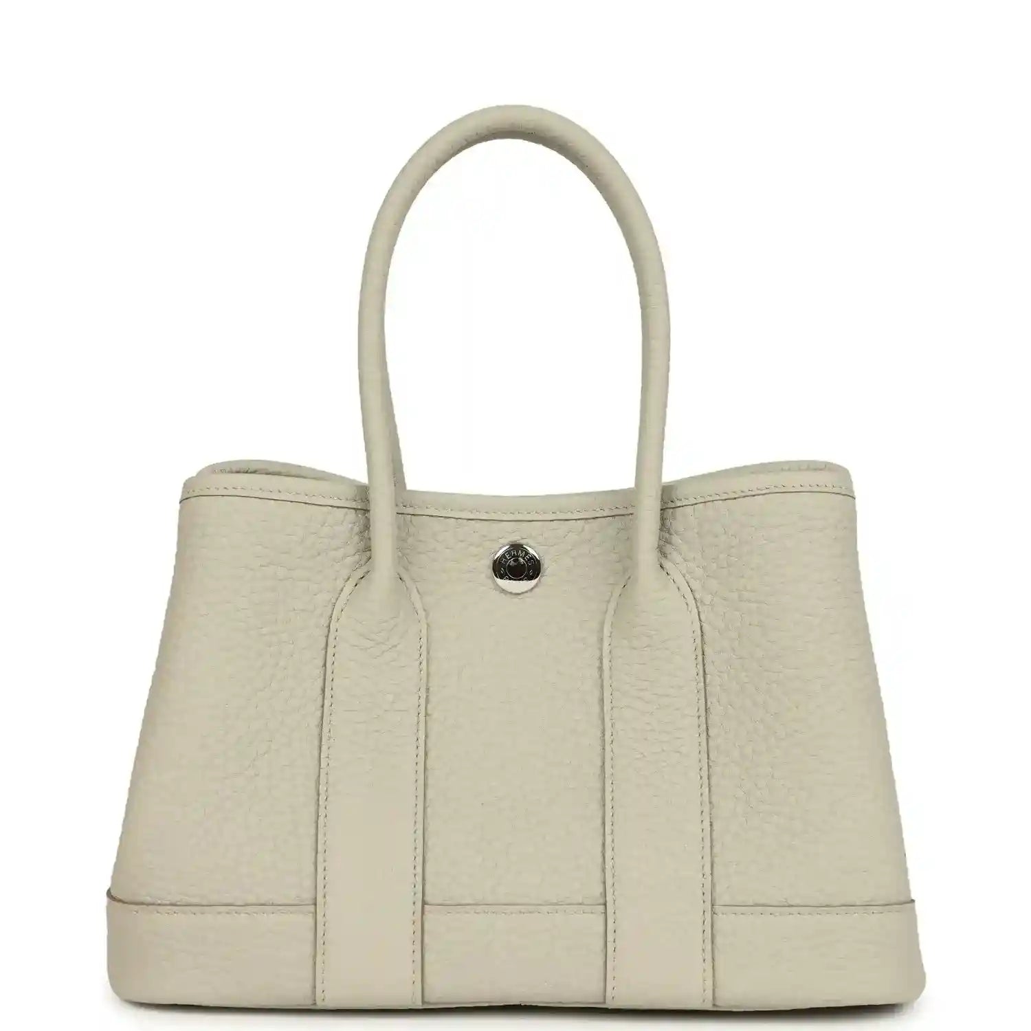 Hermes Garden Party Neo 23 tote bag front view in light beige leather with round front clasp