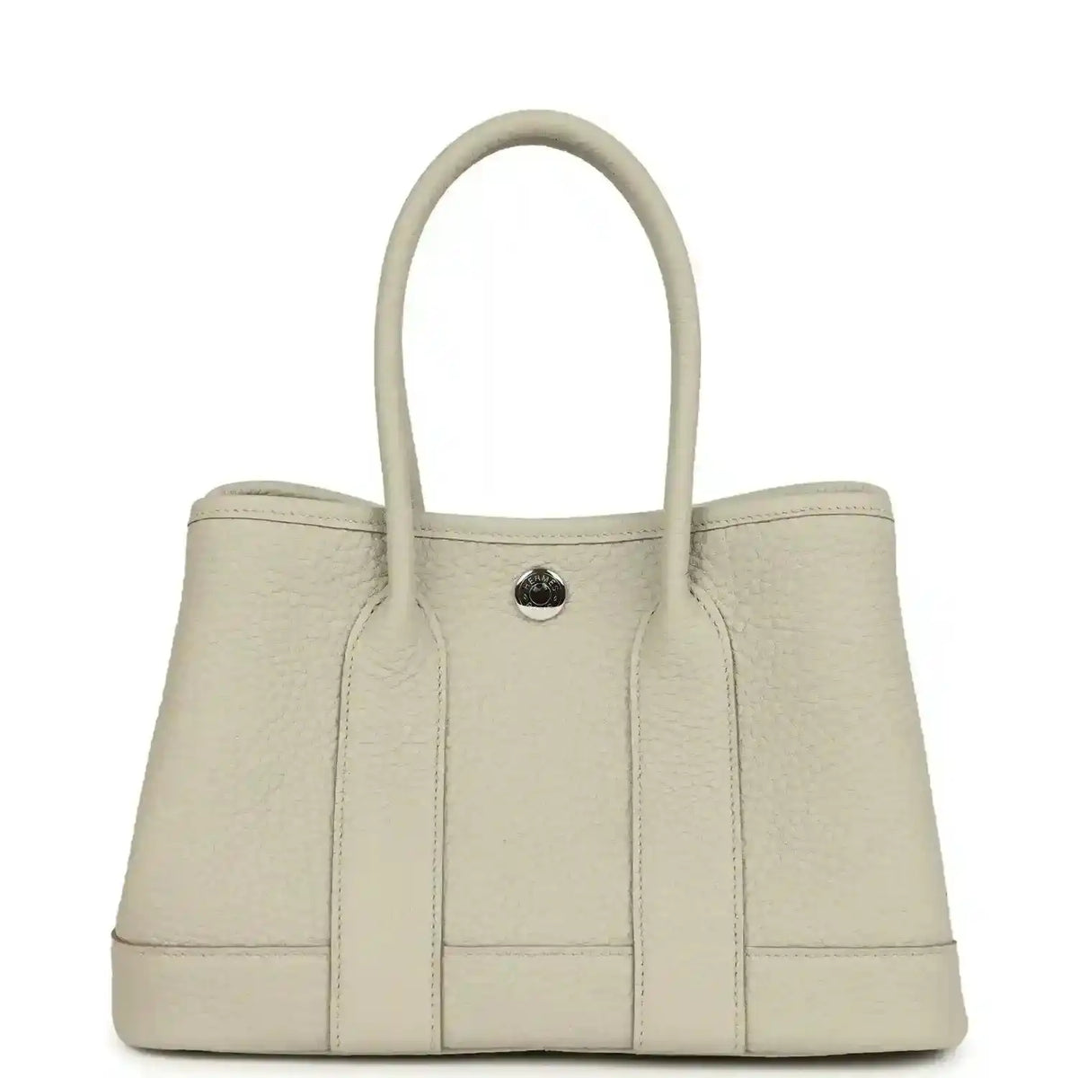 Hermes Garden Party Neo 23 tote bag front view in light beige leather with round front clasp